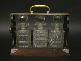 A mahogany and silver plated mounted 3 bottle tantalus