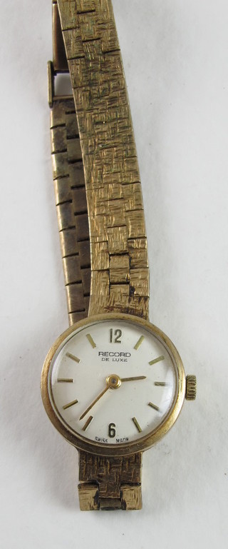 A lady's Record wristwatch contained on an integral 9ct gold bracelet