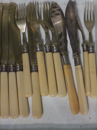 A set of 6 silver plated fish knives and forks and 2 other fish  knives