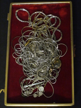 A collection of silver chains