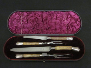 A Victorian 4 piece carving set by W Jno Barker including a  meat carving knife, poultry carving knife, cased