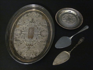 A circular engraved silver plated dish, 6", an oval galleried silver plated tray and 2 servers
