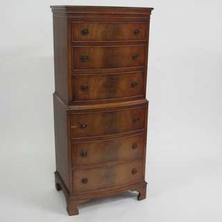 A Georgian style miniature walnut bow front chest on chest with  moulded cornice fitted 6 long drawers, raised on bracket feet 21"