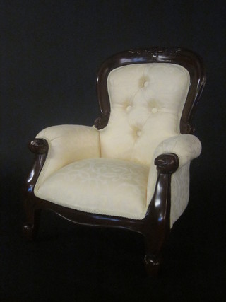 A childs Victorian style mahogany show frame chair upholstered  in yellow material