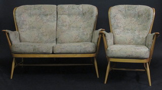 An Ercol light elm cottage style 2 seat settee and matching armchair