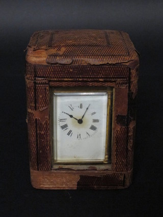 A 19th Century carriage clock with enamelled dial and Roman  numerals contained in a gilt metal case 3 1/2" together with an  associated travelling case  ILLUSTRATED