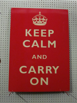 A large metal sign - Keep Calm and Carry On 27 1/2" x 19"