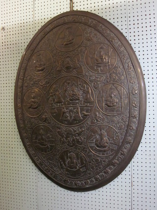 An oval embossed Rajasthan plaque depicting various figures 37"   ILLUSTRATED