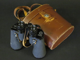 A pair of Pioneiro 10 x 50 binoculars, complete with leather  carrying case