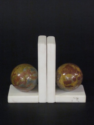 A pair of polished hardstone bookends