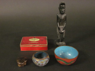 2 circular cloisonne enamelled bowls 4" and 3", a Craven A cigarette tin, a heart shaped trinket box and a carved figure of a  standing man