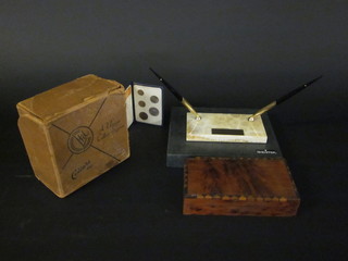 A wooden trinket box with hinged lid, a Sheaffer pen set and a carved figure