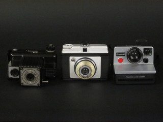 An Iford Sporti Roll camera, a Cornet Popular Twelve and a  Polaroid Pronto! B10
