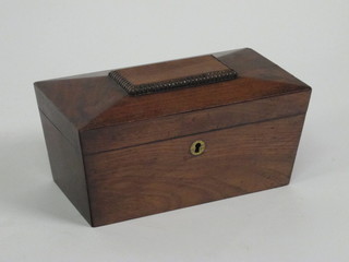 A 19th Century mahogany sarcophagus shaped twin compartment tea caddy with hinged lid 10"
