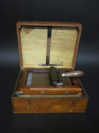An Edison mimeograph contained in a mahogany case with  hinged lid