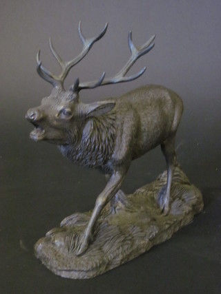 A bronzed figure of a Stag 9"