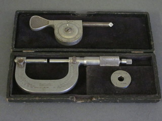 A Brown & Sharpe No.46 micrometer boxed together with a precision instrument