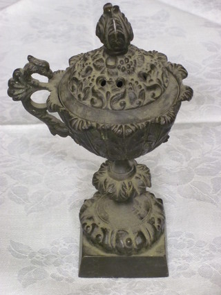 A 19th Century bronze incense burner in the form of a twin  handled lidded urn, 6", missing 1 handle,