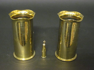 2 WWI Trench Art 6lb shell cases converted for use as vases together with a bullet cross