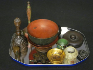 3 various Eastern lacquered bowls, a carved wooden hand bell, a  Benares hand bell, a bronze parasol handle and other curios