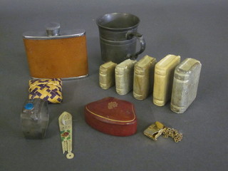 5 miniature carved stone paperweights in the form of books, a  pewter tankard and a collection of curios