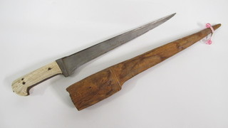 A Kard dagger with 12" blade and wooden scabbard  ILLUSTRATED