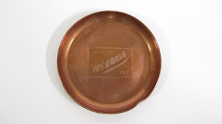 A circular embossed brass advertising ashtray marked Side Watsonian Cars 4 1/2"