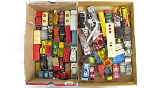2 boxes containing a collection of various toy cars