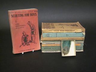 A Scout's green hackle together with a 40th Anniversary Edition  of Scouting for Boys and various other books relating to Scouts