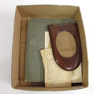 A photograph album relating to Military Life in Mesopotamia 1916-1919, a wooden photograph frame formed from a propeller,  2 Co-operation of Aircraft with Artillery manuals and a Signals  Between Airborne & Artillery card