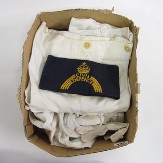 A child's sailor suit and a Civil Defence Arm Band