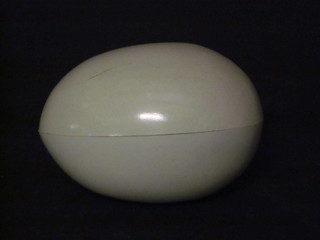 A turquoise Bakelite Easter egg cased marked The Chad Valley  Co. Ltd. 35"