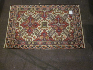A machine made Caucasian style rug 76" x 49 1/2"