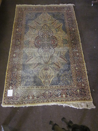 A fine Persian rug with central medallion 99" x 61", heavily  worn