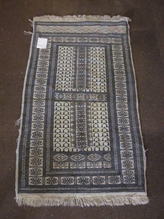 A contemporary grey ground Bokhara rug 62" x 35", some wear  to edges