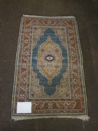 A Caucasian slip rug with central medallion 41" x 24"
