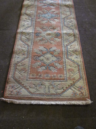 A contemporary Caucasian style runner with 7 octagons to the  centre 114" x 30"