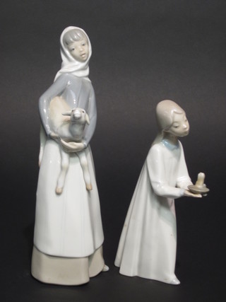A Lladro figure of a standing lady with lamb, f and r, 10" and 1 other standing girl with chamber stick 8", f and r,