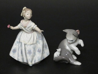 A Lladro figure of a standing girl 5", base incised 5373 together with ditto cat, based incised F-16D, 3"