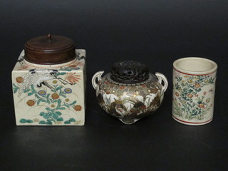 A 19th Century square Japanese Satsuma caddy with wooden lid  3", together with a cylindrical vase 3" and a twin handled urn  with associated hard wood cover 2"