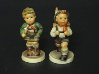 A Goebel figure - The Hiker and 1 other standing boy with bugle, f,
