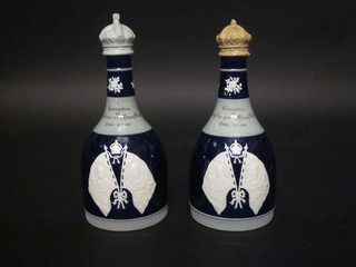 A pair of Spode club shaped decanters and stoppers to  commemorate George V Coronation and made for Andrew  Nasher & Co., 1 stopper f,