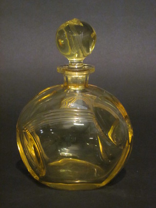 An Art Deco yellow tinted glass decanter of panelled form 8"