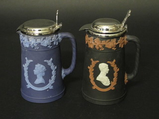 A Wedgwood Jasperware limited edition jug to commemorate  The Queen's Silver Jubilee no. 343/400 5 1/2" and 1 other to  commemorate Prince Charles Wedding 1981 - 273/1000, boxed