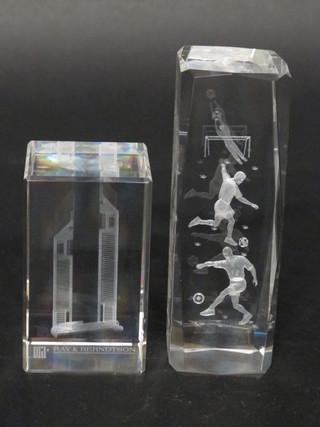A Precise rectangular glass 3 dimensional paperweight decorated the New York Twin Towers Trade Centre and marked Ray and  Berndtson 4" and 1 other decorated footballers