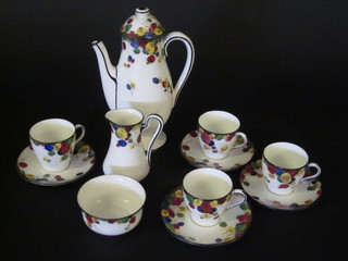 An 11 piece Royal Doulton coffee service comprising coffee pot, f, cream jug, sugar bowl - cracked, 4 coffee cans - 3 cracked, 4  saucers, base marked M1751