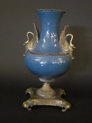 An impressive blue Celadon twin handled vase with gilt metal mounts, the handles in the form of swans, 20"
