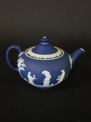 A Wedgwood blue Jasperware circular teapot, base impressed Wedgwood England 6", chip to lid,
