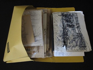 A yellow card folder containing various drawings