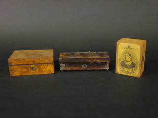 A 19th Century rectangular walnut box with hinged lid 7", a square walnut box with hinged lid 6" and a pine money box the  lid decorated Queen Victoria 5"